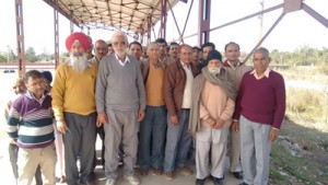 PoK refugees posing for photograph after a meeting at Hiranagar in district Kathua on Sunday.