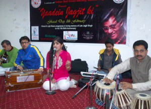 Young artiste singing Jagjit Singhs’ ghazal in the programme at Red Cross Bhavan Auditorium on Sunday. -Excelsior/Rakesh