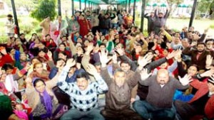 Masters protesting outside the Directorate of School Education in Jammu on Thursday. -Excelsior/Rakesh