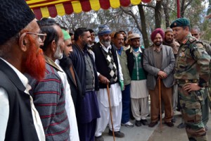 Commanding Officer, Baloni Battalion, interacting with veterans during a rally at Sagra in Mendhar.