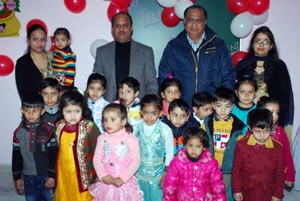 Children posing alongwith dignitaries during inaugural function of Theatrical Play-Way School in Jammu.