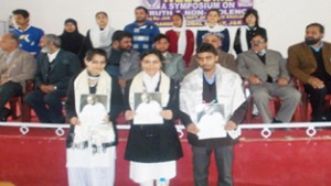 Winners of Symposium posing for a group photograph at GDC Rajouri on Saturday. 