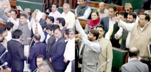 BJP MLAs raising anti-Pak slogans (L) and NC legislators pressing for discussion on adjournment motion in Legislative Assembly on Sunday. —Excelsior/Rakesh