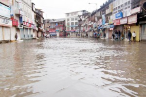 A view of waterlogged Hari Singh High Street in Srinagar following heavy rains on Sunday.        