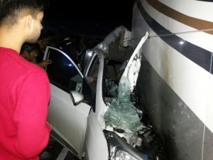 A fully damaged i-10 car which rammed into a bus at Barnoti Kathua on Tuesday.