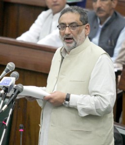 Finance Minister Dr Haseeb Drabu presenting budget in the Assembly on Sunday.—Excelsior/Rakesh