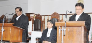 Chief Justice N Paul Vasanthakumar administering oath to Justice Janak Raj Kotwal on Wednesday.