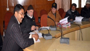 DEO Leh Saugat Biswas chairing a meeting on Monday.