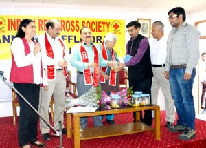 Divisional Commissioner, Jammu, Dr Pawan Kotwal and others during a Raffle Draw function organized by IRCS at Jammu.