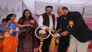 Bali Bhagat MLA, lighting ceremonial lamp during the annual function on Saturday.
