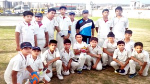 Youngsters of Sehwag Cricket Academy posing for a photograph before leaving for Delhi to participate in Under-14 cricket tournament.