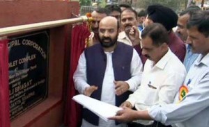 Minister for Social Welfare, Bali Bhagat after laying foundation stone of Shouchalya complex at Roop Nagar on Saturday.