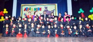 Students of Apple Kids International Pre-School posing for a group photograph while celebrating annual day.    