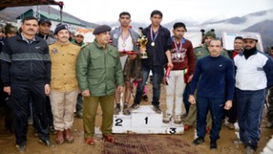 Winners of ‘Half Marathon’ posing for a group photograph. -Excelsior/ Pervaiz