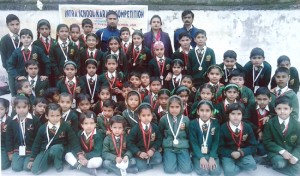 Medal winning Karatekas of GFPHS posing for a group photograph along with the School Principal on Saturday.  