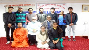 ESRM artists who performed in the play ‘Aaeenna’ posing for a group photograph at Jammu on Monday.