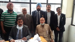 Doctors examining patients during the screening camp for Congenital Heart Diseases at Rotary Club in Rajouri.