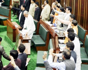 Ruling PDP-BJP MLAs protesting in Assembly on Sunday.—Excelsior/Rakesh