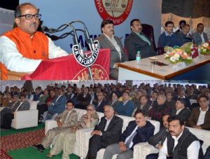 Deputy Chief Minister addressing a function organised by CCI at Jammu on Friday.