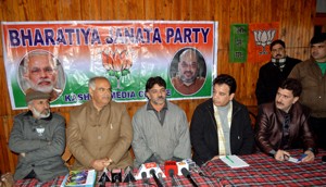 BJP leaders addressing media persons at Srinagar on Tuesday. —Excelsior/Amin War