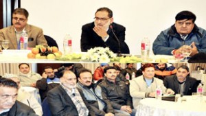 Finance Minister Haseeb Drabu chairing a meeting at Srinagar on Monday.