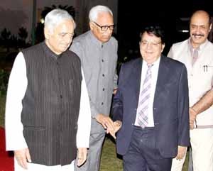 Governor, Chief Minister and Legislative Council Chairman at dinner on Wednesday.