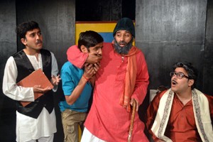 A scene from the play ‘Hangama Ho Gaya’ staged by Natrang on Sunday.