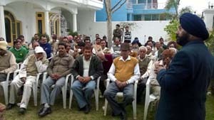Cong leader Manjit Singh addressing party workers at Vijaypur on Sunday.