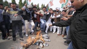 PYC activists burning effigy of PM during anti-BJP protest in Jammu on Sunday.
