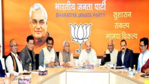 BJP National President Amit Shah chairing a high level party meeting to discuss issues related to Northeast at party headquarters at New Delhi. Also seen in picture are Ram Lal, Ram Madhav, Dr Jitendra Singh, Sarbananda Sonowal and Kiren Rijiju. 