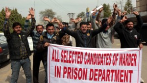 Jail Warden candidates during a protest at Jammu on Wednesday. —Excelsior/Rakesh