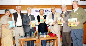 Dy Chief Minister Dr Nirmal Singh alongwith other dignitaries releasing a book during inauguration of ‘Saman Bal 2015’ at KP Sabha, Ambphalla on Saturday.