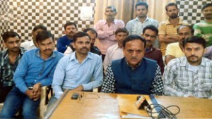 NMC president, Subash Shastri alongwith others addressing media persons at Jammu on Tuesday.