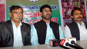 BJP MLC Surinder Ambardar and leader of Party’s Displaced Unit at a press conference at Jammu on Thursday. —Excelsior/Rakesh