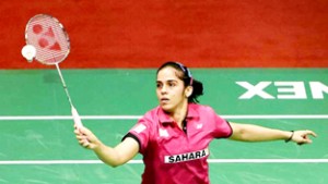 Saina Nehwal executing a fore-hand shot during a match of Malaysia Open at Kuala Lumpur on Thursday.. 