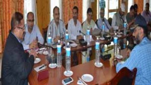 Divisional Commissioner Jammu, Dr Pawan Kotwal chairing a meeting on Wednesday.