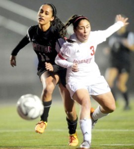 Star performer Shweta Dixit in action during a match of girls' soccer. 