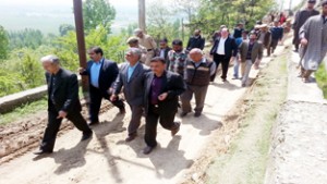 Divisional Commissioner Gazzanfar Hussain and Deputy Commissioner Ganderbal, Showkat Aziz taking stock of damages caused by incessant rains.