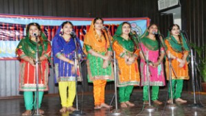 Students presenting a folk song during Lok Rang Mahotsana at JU on Thursday.