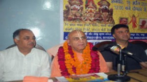 Navayogendra Swami Maharaj alongwith members of Shree Jagannath Rath Yatra Committee addressing media persons at Jammu on Thursday.