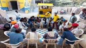 Officials of Ambuja Cement interacting with masons during an awareness camp at Jammu.