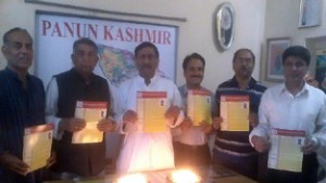 MLC Vibodh Gupta & others lighting lamp during function at Rajouri on Tuesday. 