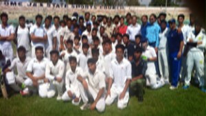 Players posing for a group photograph along with DIG Jammu, Shakeel Beig and other dignitaries at MA Stadium in Jammu. 