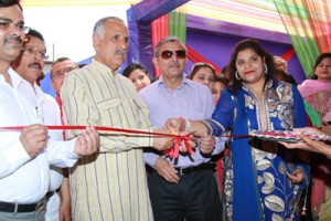 Shamsher Singh Manhas, MP and  Dr Anil Kumar, chairman Sanfort group of schools during inauguration of new branch on Monday.