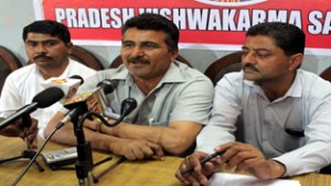 Representatives of Vishwakarma Sabha talking to reporters at Jammu on Tuesday.  -Excelsior/Rakesh