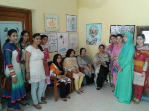 Winners and other participants of slogan writing, poster making and collage making competition posing for a photograph at Govt College of Education in Jammu.