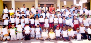 Students posing for a photograph after passing belt grading test at GD Goenka Public School in Jammu.