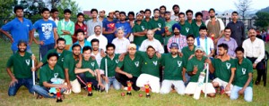 Winners of a cricket championship posing for group photograph in Jammu on Wednesday.