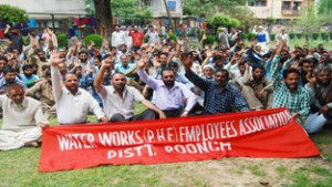 PHE employees staging protest at Poonch on Thursday.