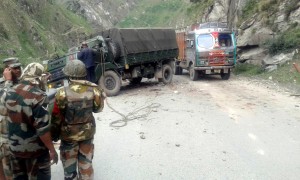 The ill-fated vehicle after tree falls on it at Pantiyal in district Ramban.